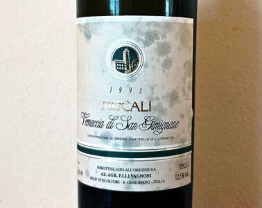 Wine bottle label showing the year 1993 and the text Tennaccia di San Gimignano with a circular crest above.