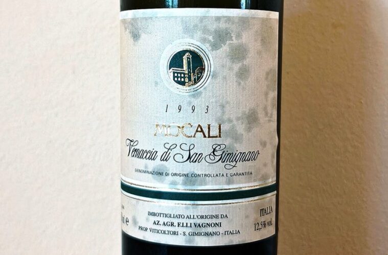 Wine bottle label showing the year 1993 and the text Tennaccia di San Gimignano with a circular crest above.